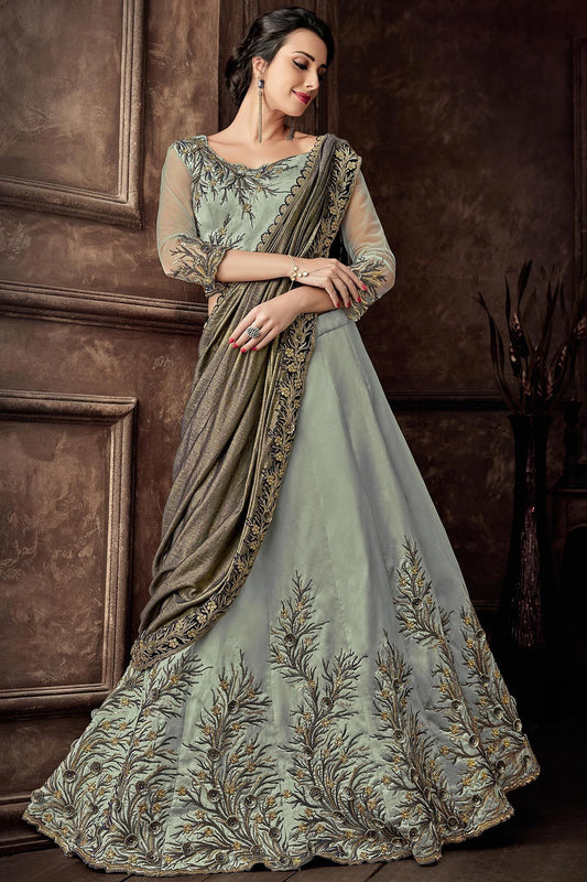Green colored Taffetta Silk Lehenga Set
