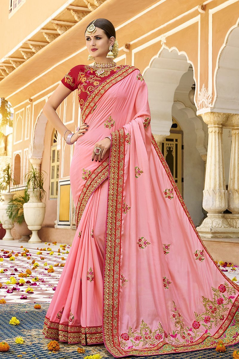 Peach colored Silk Saree with Maroon colored Blouse