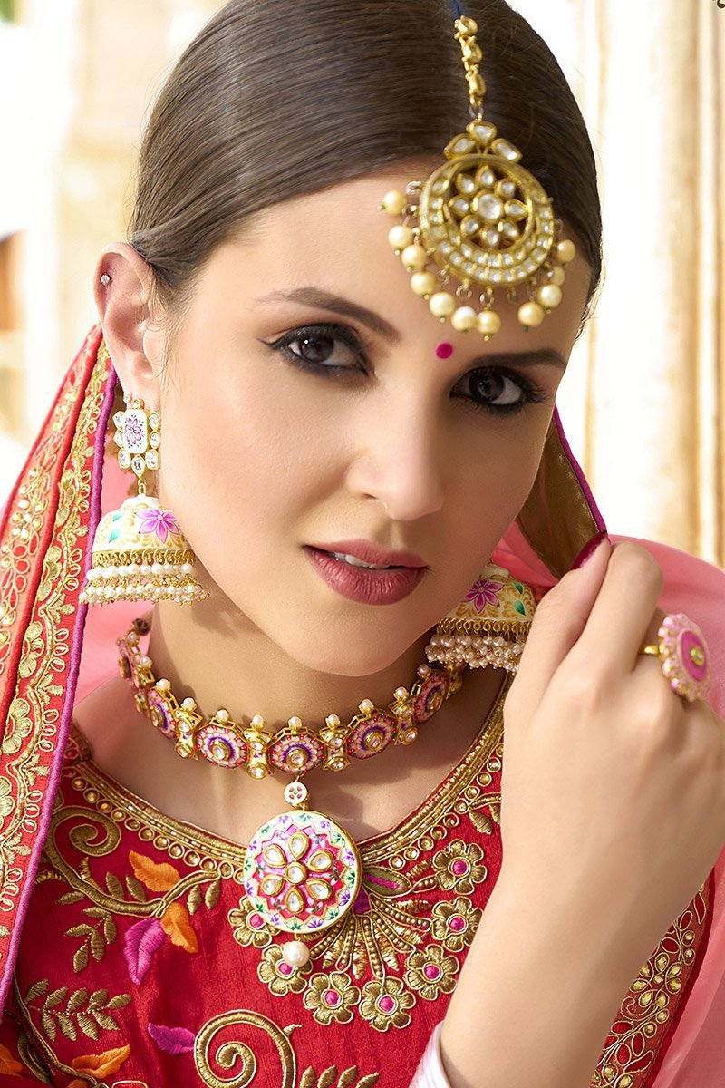 Peach colored Silk Saree with Maroon colored Blouse