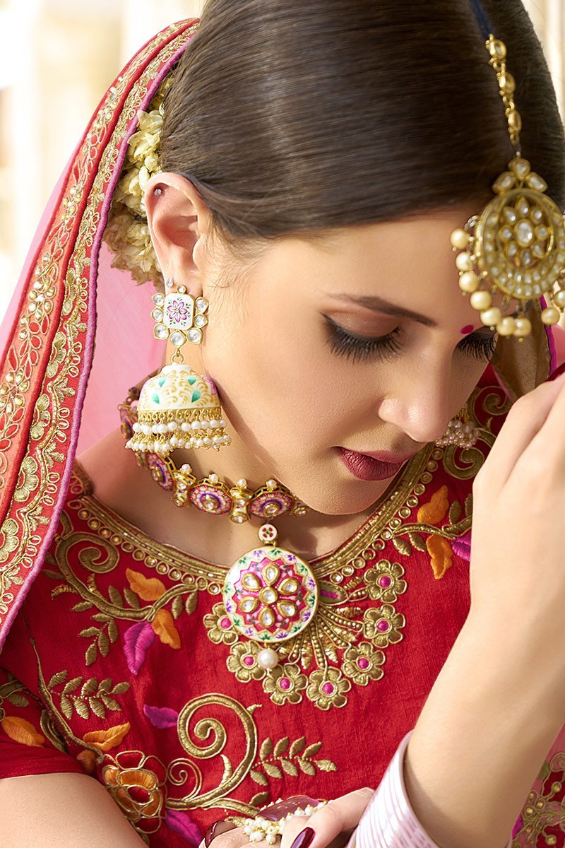 Peach colored Silk Saree with Maroon colored Blouse