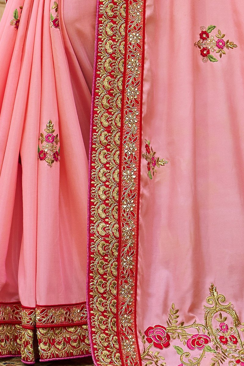 Peach colored Silk Saree with Maroon colored Blouse