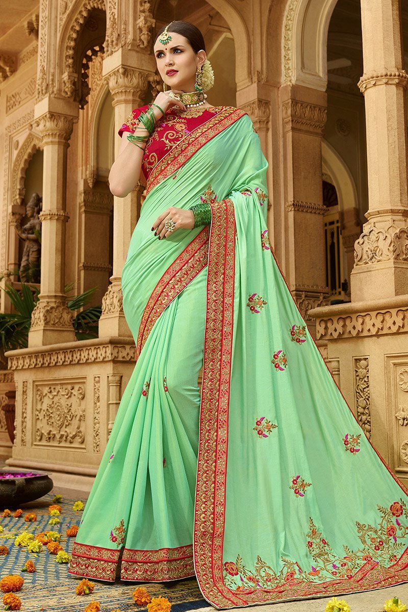 Mint-Green colored Silk Saree with Maroon colored Blouse