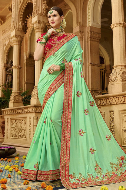 Mint-Green colored Silk Saree with Maroon colored Blouse