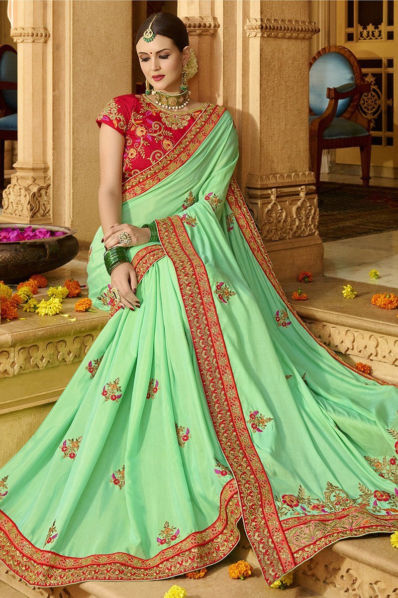 Mint-Green colored Silk Saree with Maroon colored Blouse