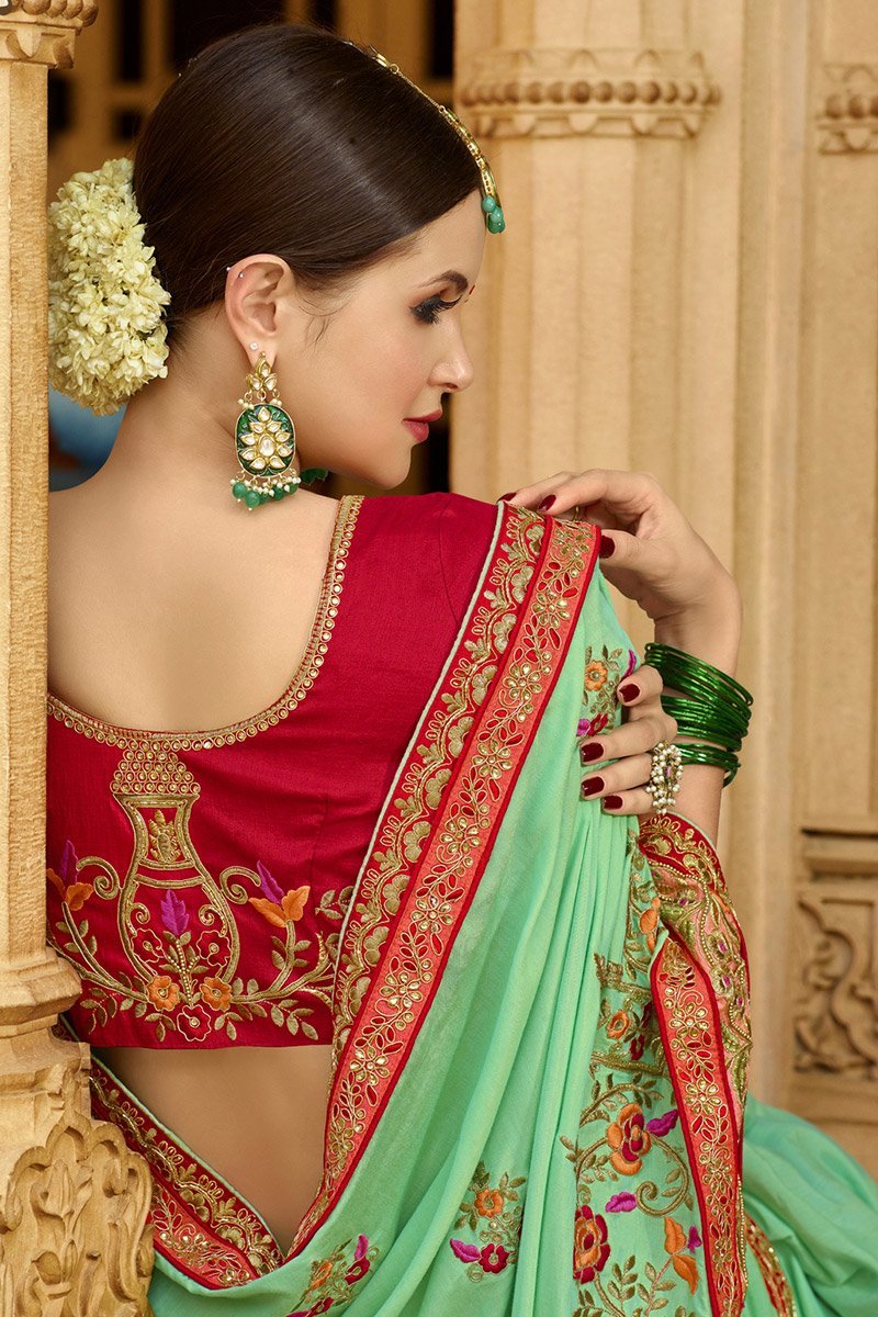 Mint-Green colored Silk Saree with Maroon colored Blouse