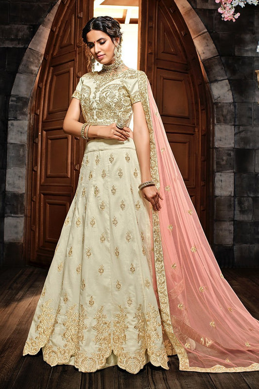 Daazzling White Lehenga set with golden threadwork