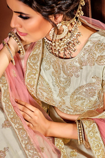 Daazzling White Lehenga set with golden threadwork
