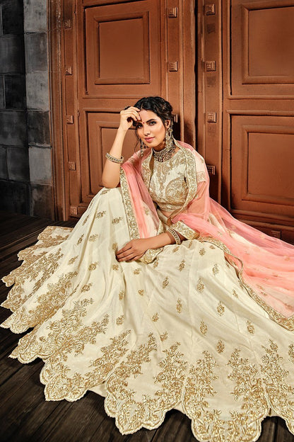 Daazzling White Lehenga set with golden threadwork