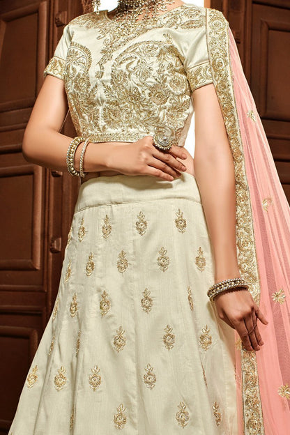 Daazzling White Lehenga set with golden threadwork