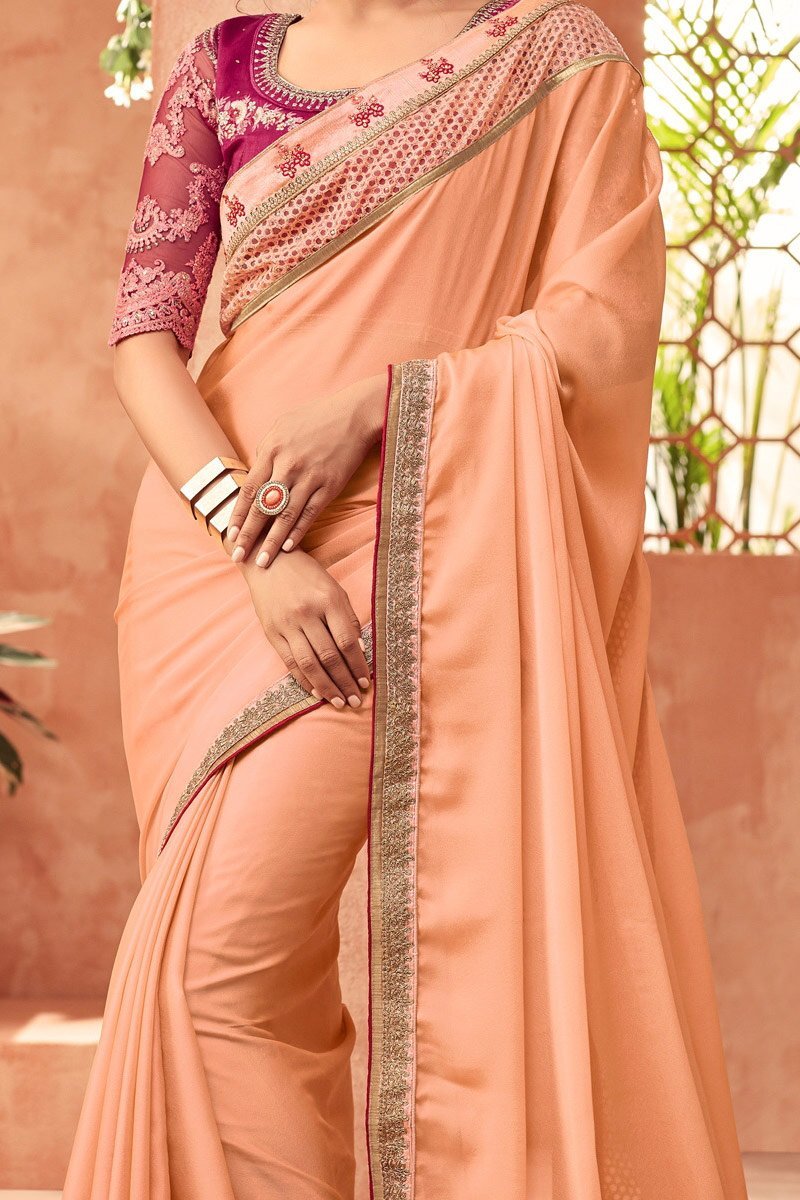 Powder-Pink Glitter Georgette Saree With Magenta Blouse
