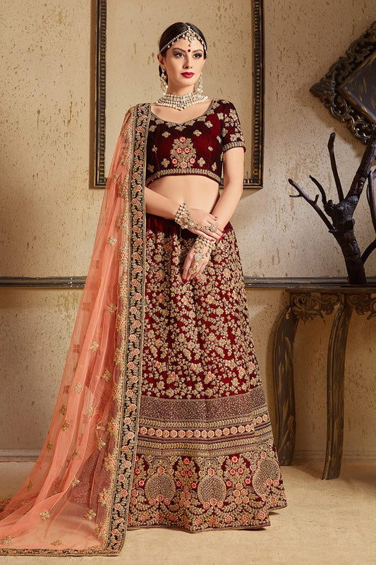 Stunning Maroon colored Pure Velvet Lehenga set