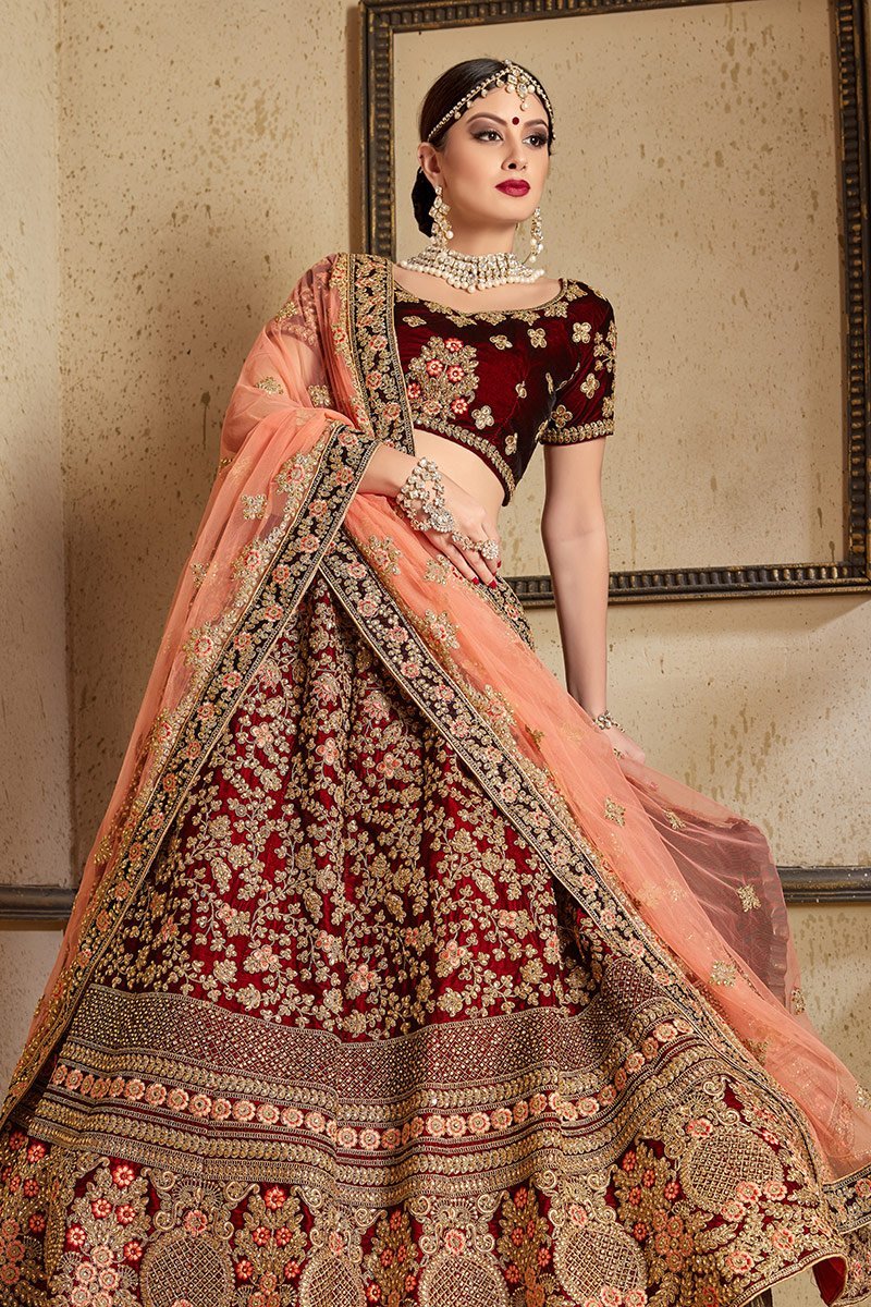 Stunning Maroon colored Pure Velvet Lehenga set