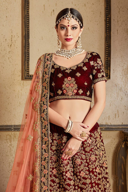 Stunning Maroon colored Pure Velvet Lehenga set
