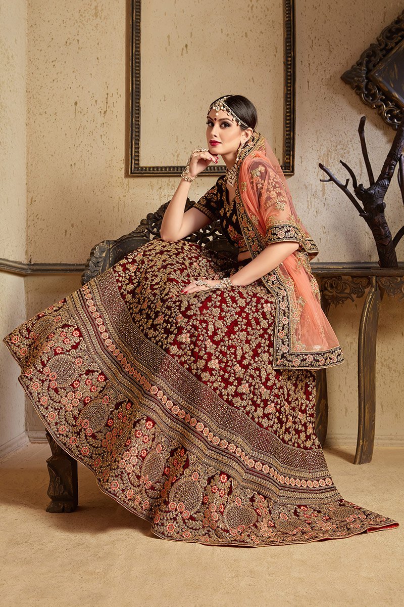 Stunning Maroon colored Pure Velvet Lehenga set