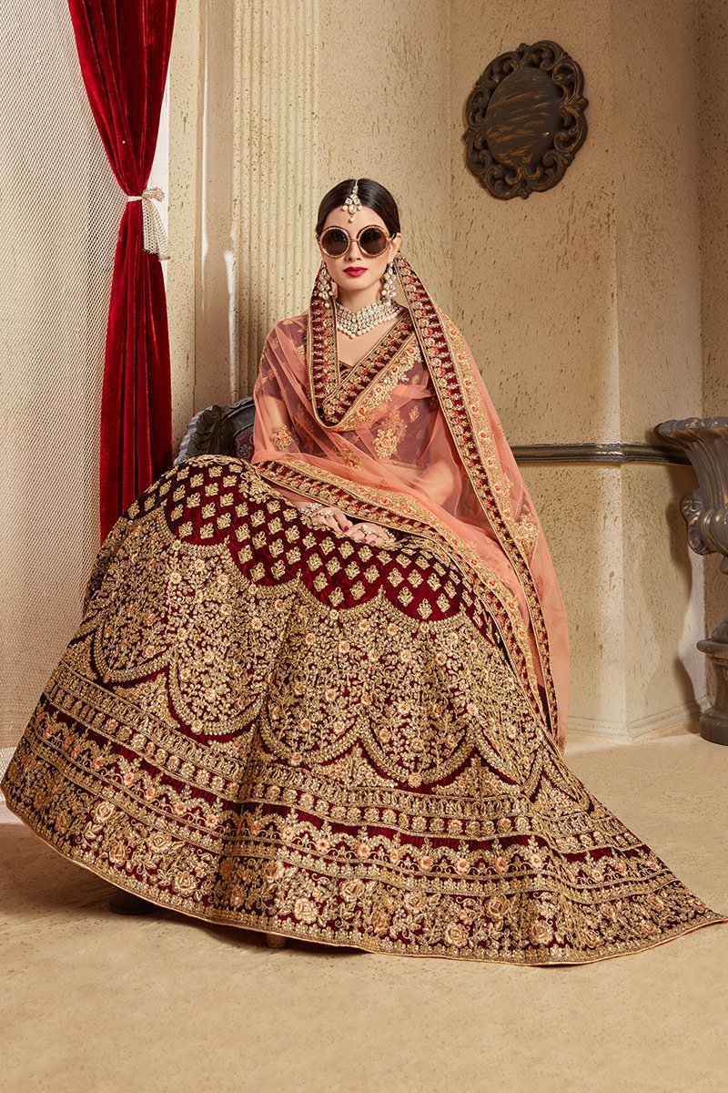 Majestic Maroon colored Pure Velvet Lehenga Set