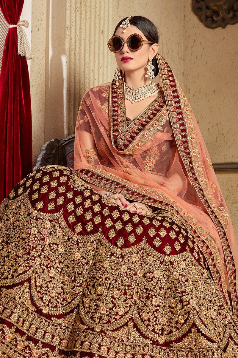 Majestic Maroon colored Pure Velvet Lehenga Set