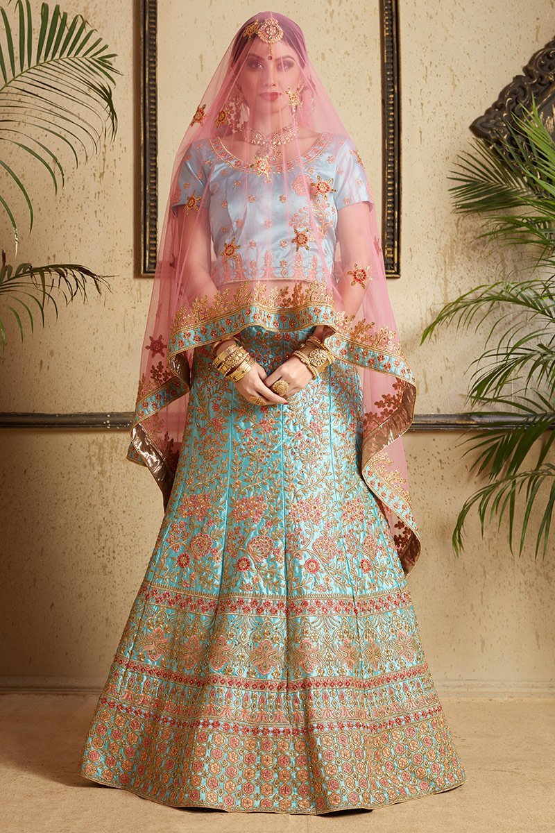 Firozi Lehenga Set with elegant artwork in gold