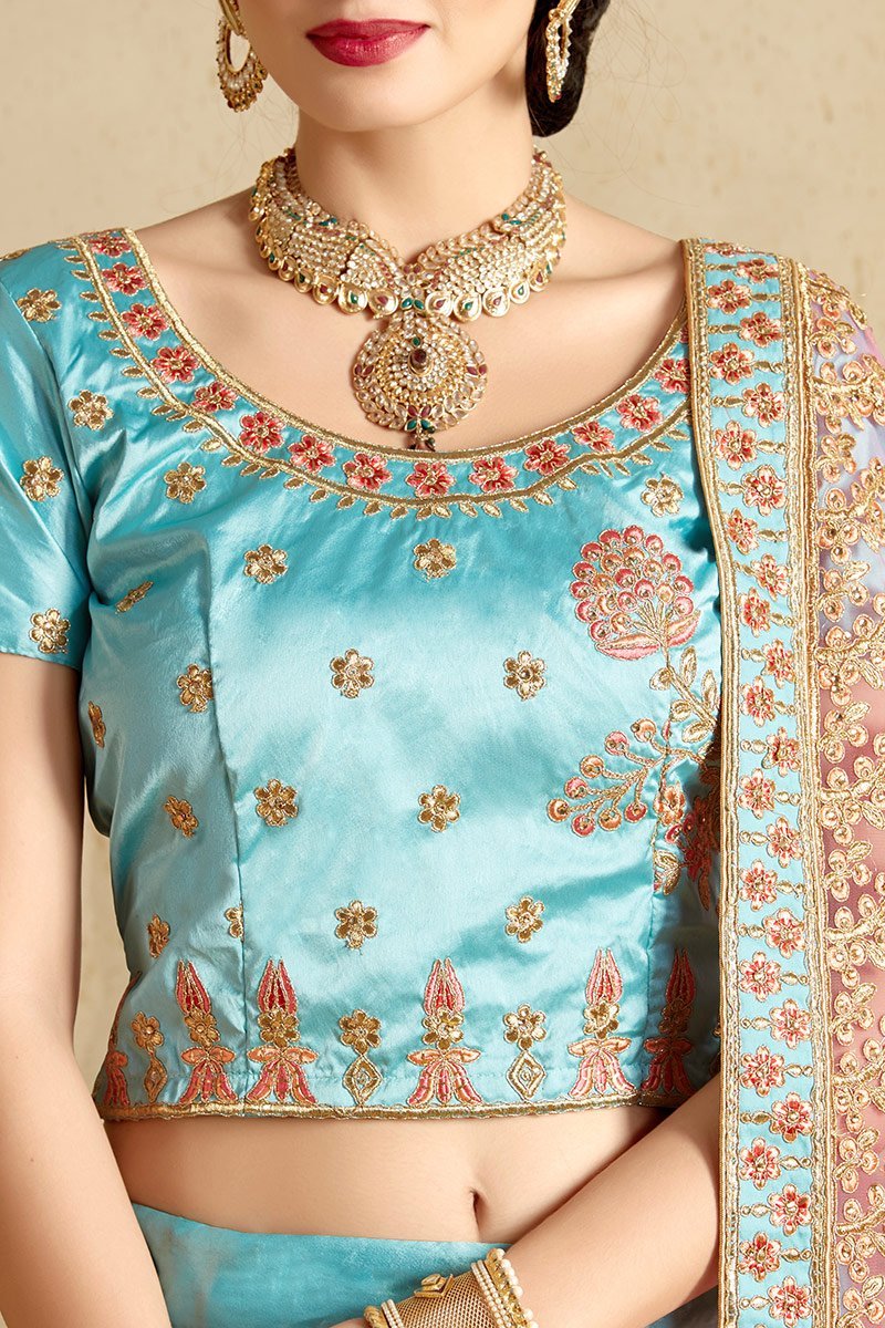 Firozi Lehenga Set with elegant artwork in gold