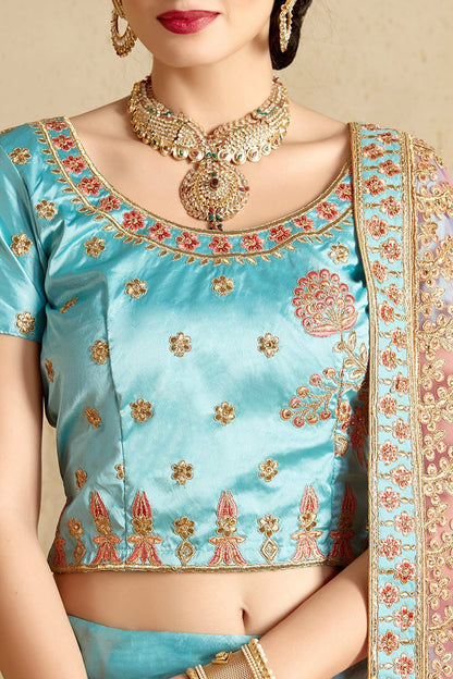 Firozi Lehenga Set with elegant artwork in gold